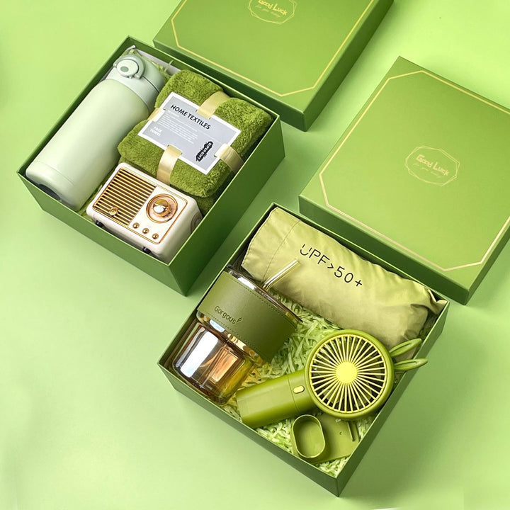Unisex multifunctional gift box with a portable fan, a glass mug, and a towel from Kalsten