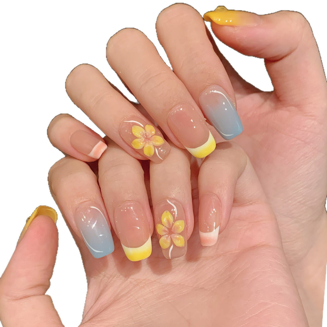 Artistic Press-On Nail Set with Floral Designs and Ombre Accents