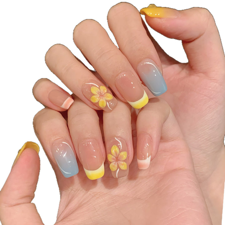 Artistic Press-On Nail Set with Floral Designs and Ombre Accents