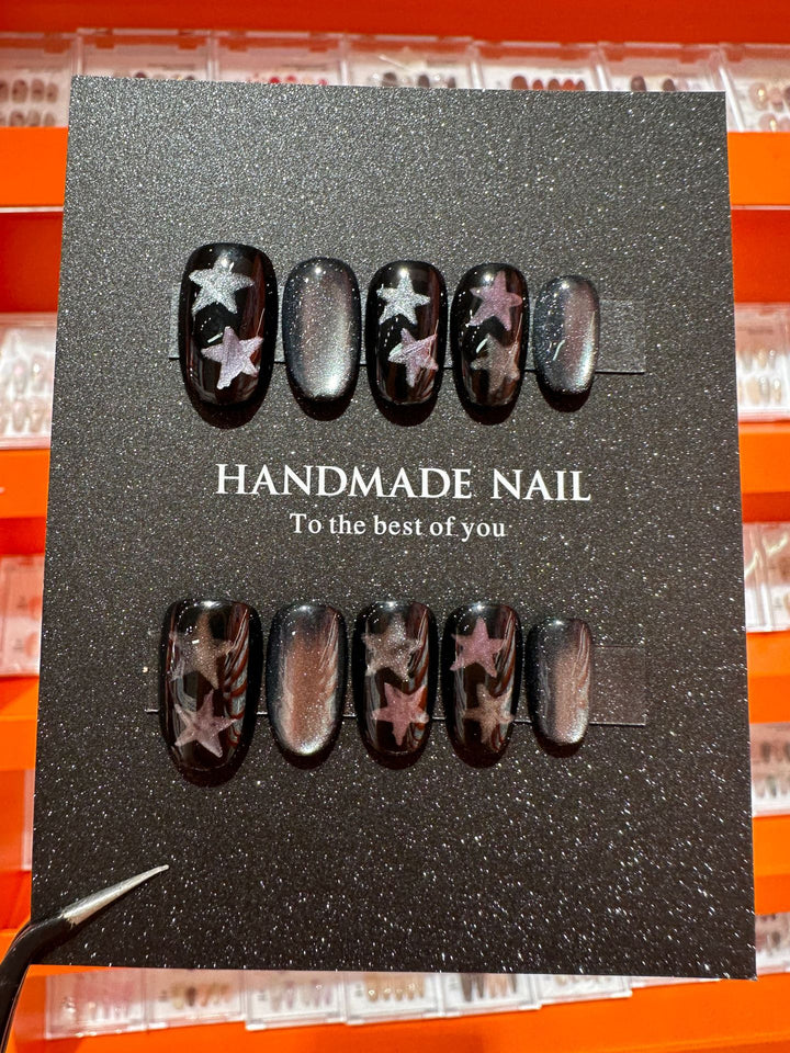Artistic Press-On Nail Art Set Featuring Handmade Star Designs