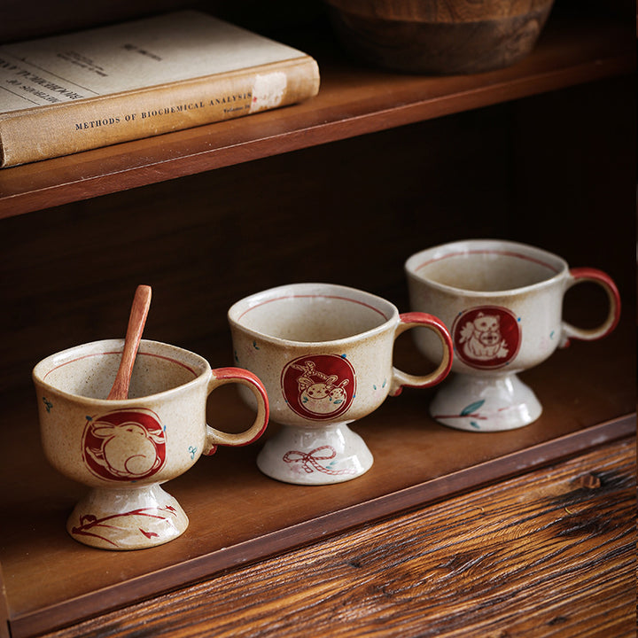 Ceramic foot mug with handle and hand-painted rabbit illustration