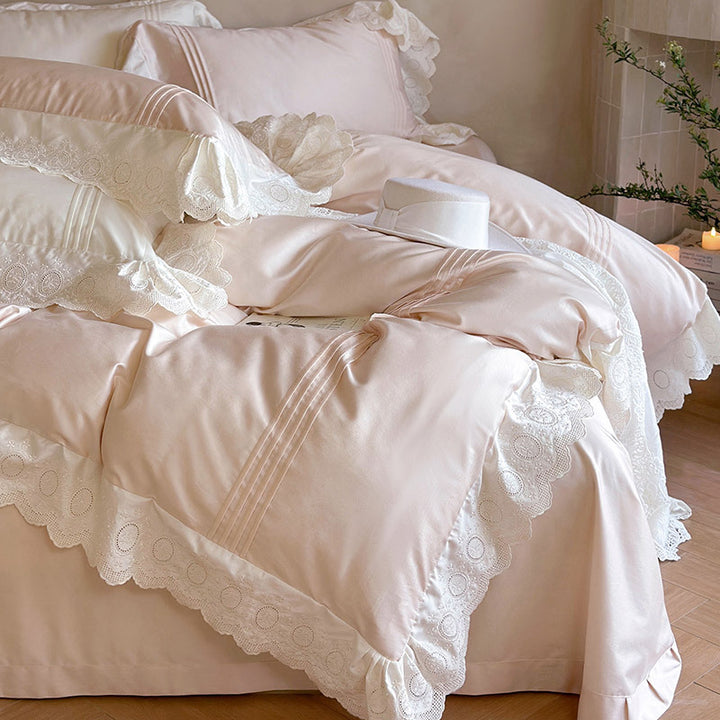 Fine cotton satin bed set with lace, ruffles and decorative stitching