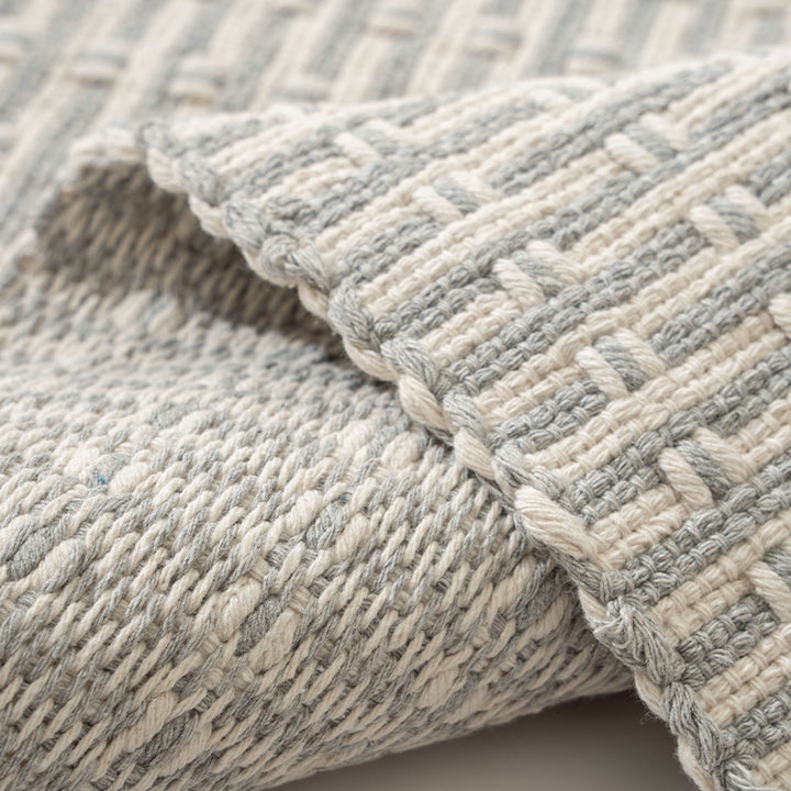 Woven placemat made of cotton blend with waffle texture