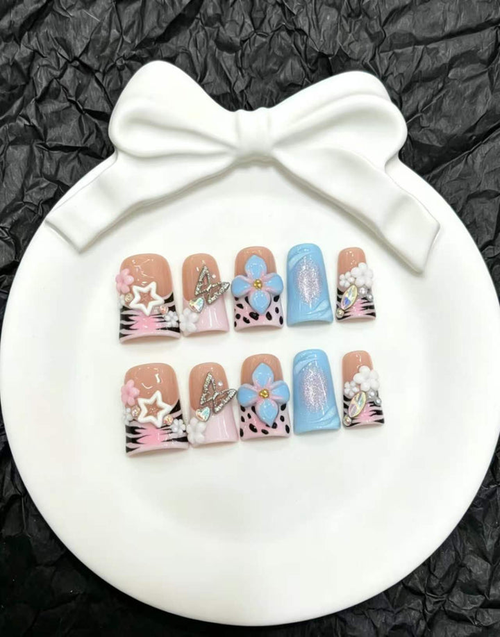 Artistic Nail Art Press-On Set with Floral and Gem Accents