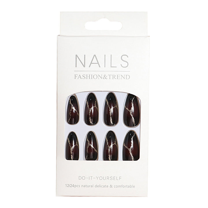 Artistic Press-On Nail Design with Gold Veining Accents Kalsten