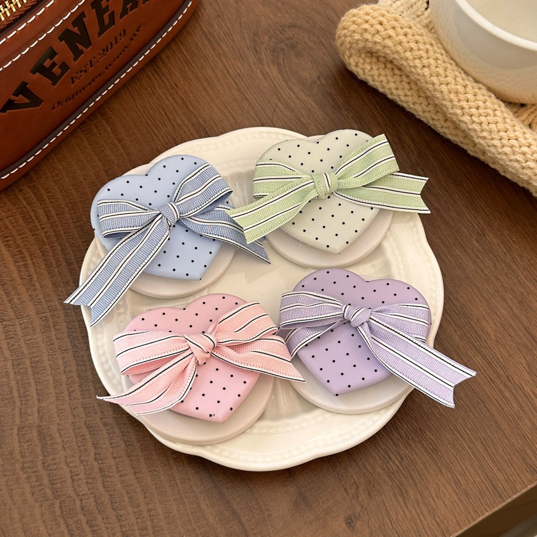 Heart-shaped cosmetic box with bow motif Kalsten
