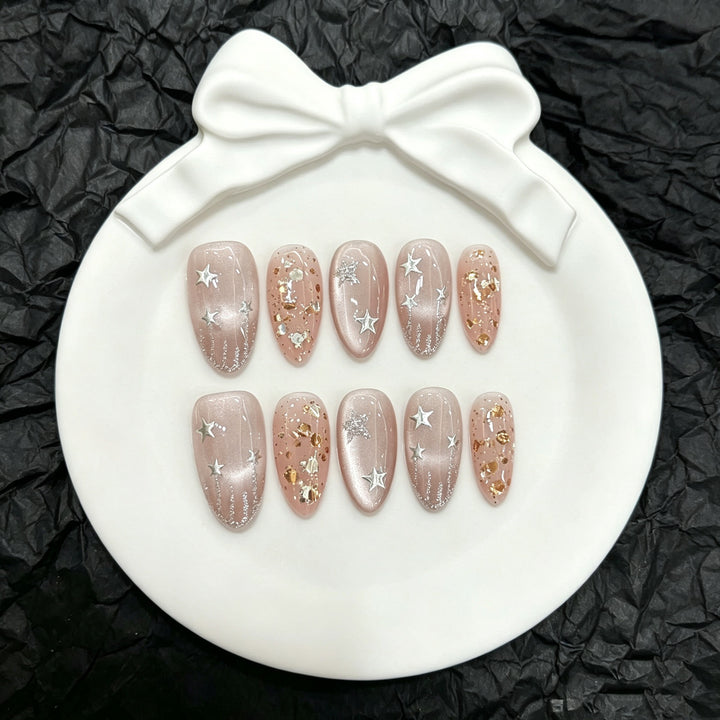 Artistic Press-On Nail Set with Stellar Design
