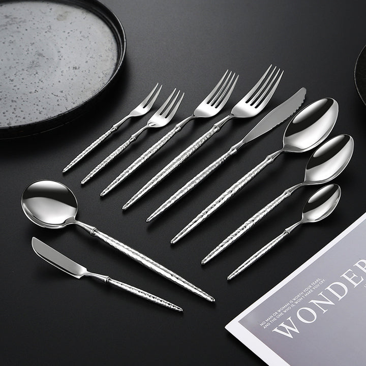 Elegant soup spoon with structured handle Kalsten