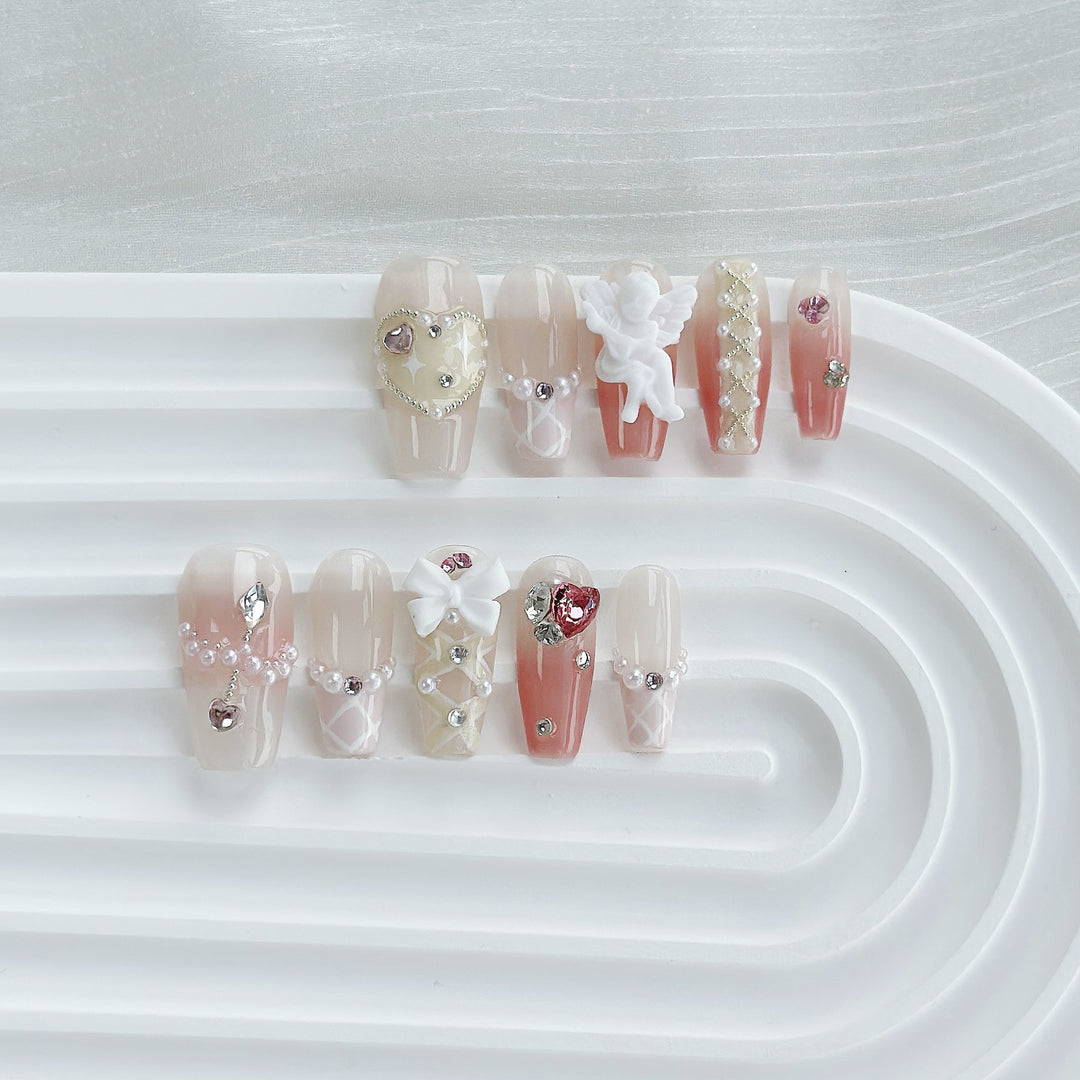 Artistic Press-On Nail Art Set with Heart and Celestial Designs