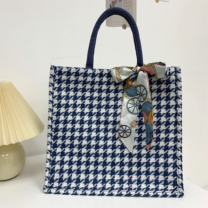 Elegant Houndstooth Handbag with Decorative Bow