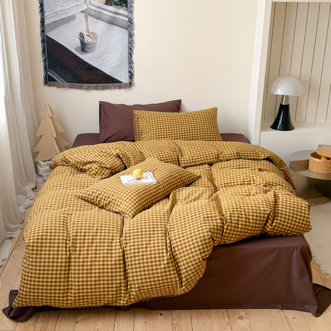 Reversible checkered bedding set made of cotton satin with quilted look and fitted sheet