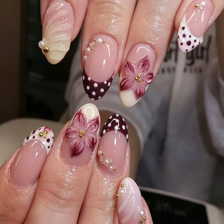 Artificial nail set with floral details and glitter accents Kalsten