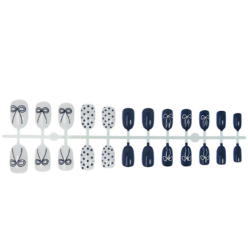 Nail set with stylish bows and dots Kalsten