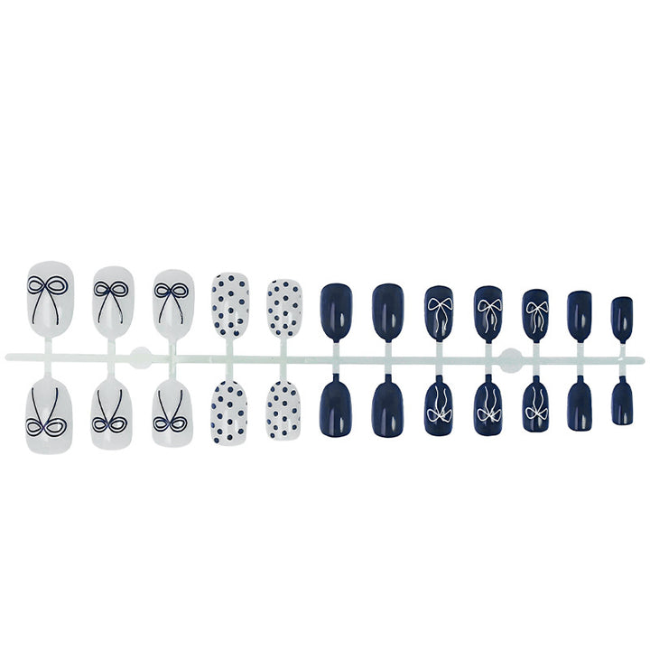 Nail set with stylish bows and dots Kalsten