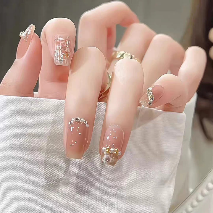 Artificial nails with elegant pearl and glitter decorations Kalsten