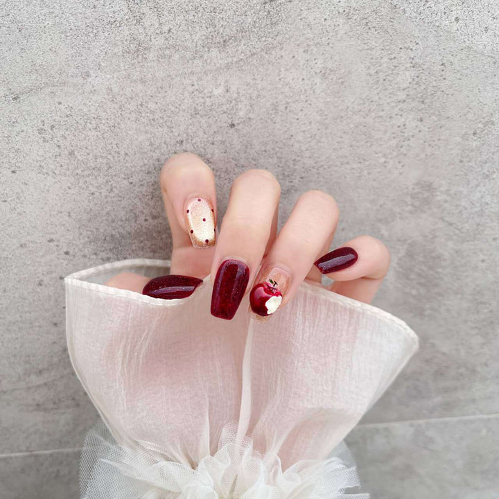 Artistic Press-On Nail Art Set with Creative Apple and Polka Dot Designs