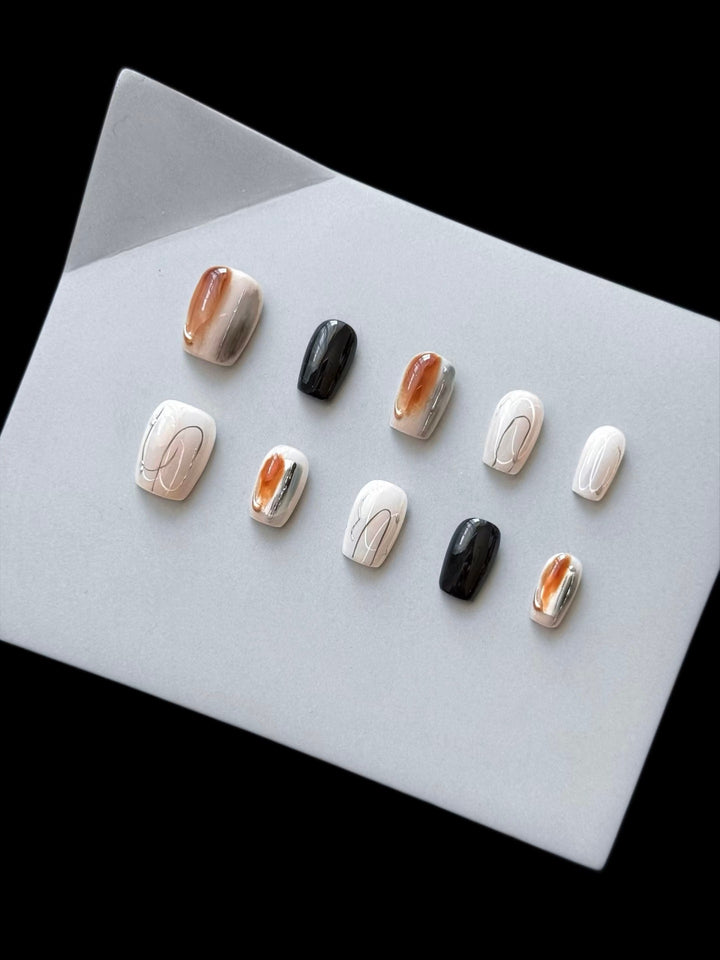 Artistic Press-On Nail Set with Marble and Glossy Finish