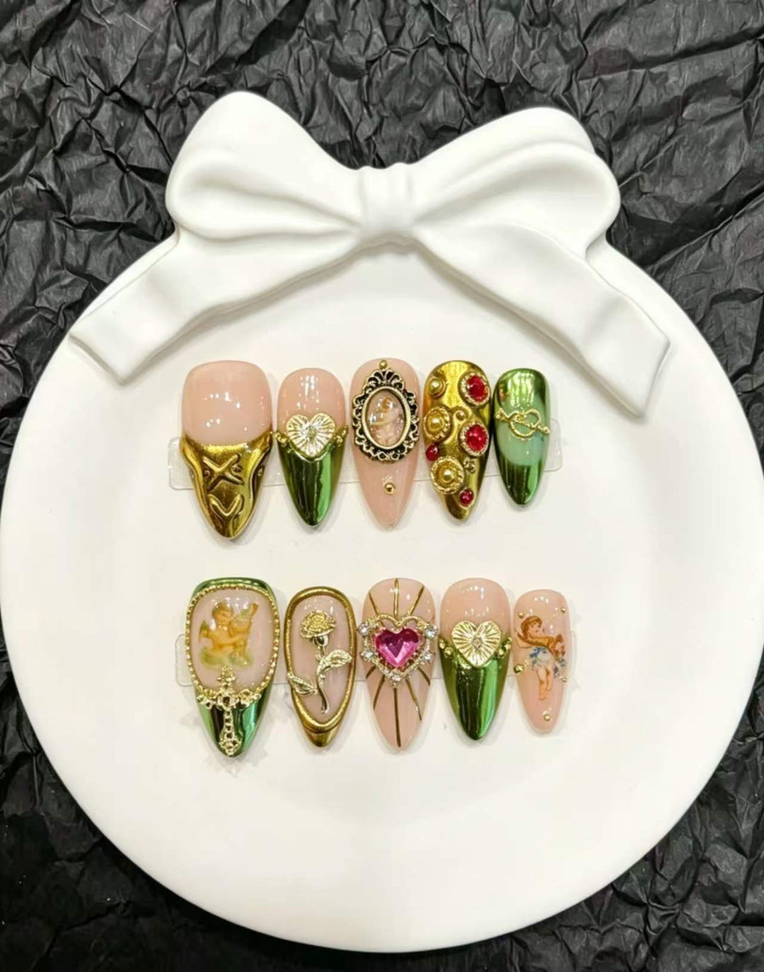 Artistic Press-On Nail Set with Intricate Metallic Accents