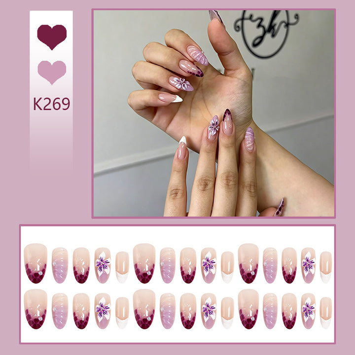 Artificial nails with elegant ombre effects and floral accents Kalsten