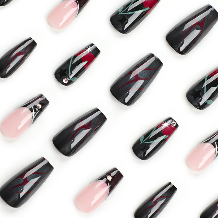 Artful nail art with elegant glitter accents and floral design Kalsten
