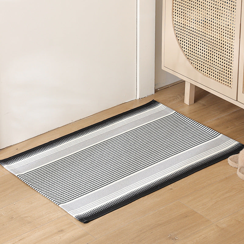 Flat striped carpet runner made of cotton blend with anti-slip coating and easy-care woven structure