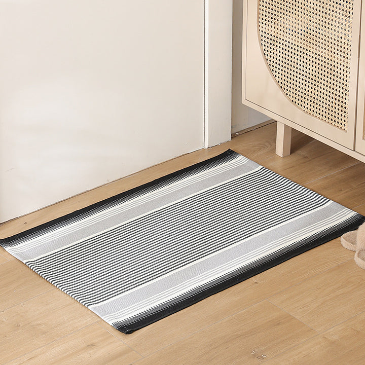 Flat striped carpet runner made of cotton blend with anti-slip coating and easy-care woven structure