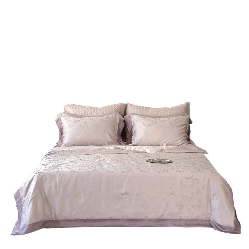Luxurious quilt bedding set made of satin with embossed wave relief and satin border