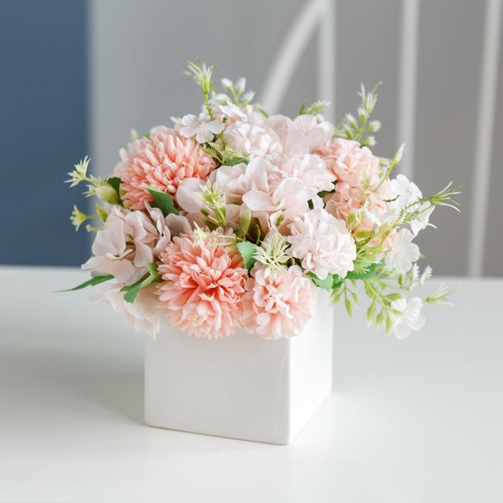 Lifelike Floral Arrangement in Decorative Square Planter