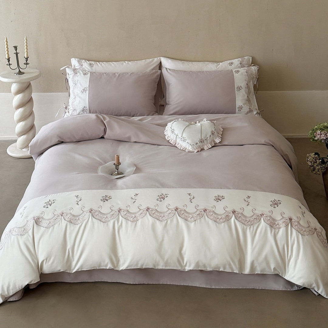 Luxurious embroidered satin bedding set with ruffled hem
