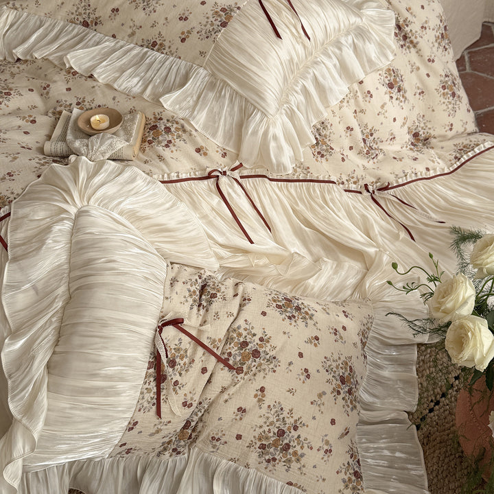 Bedding set with pleated satin bed skirt and vintage floral print