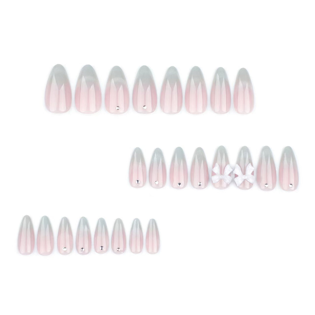 Elegant Stiletto Press-On Nails with Decorative Bow and Gemstone Accents Kalsten