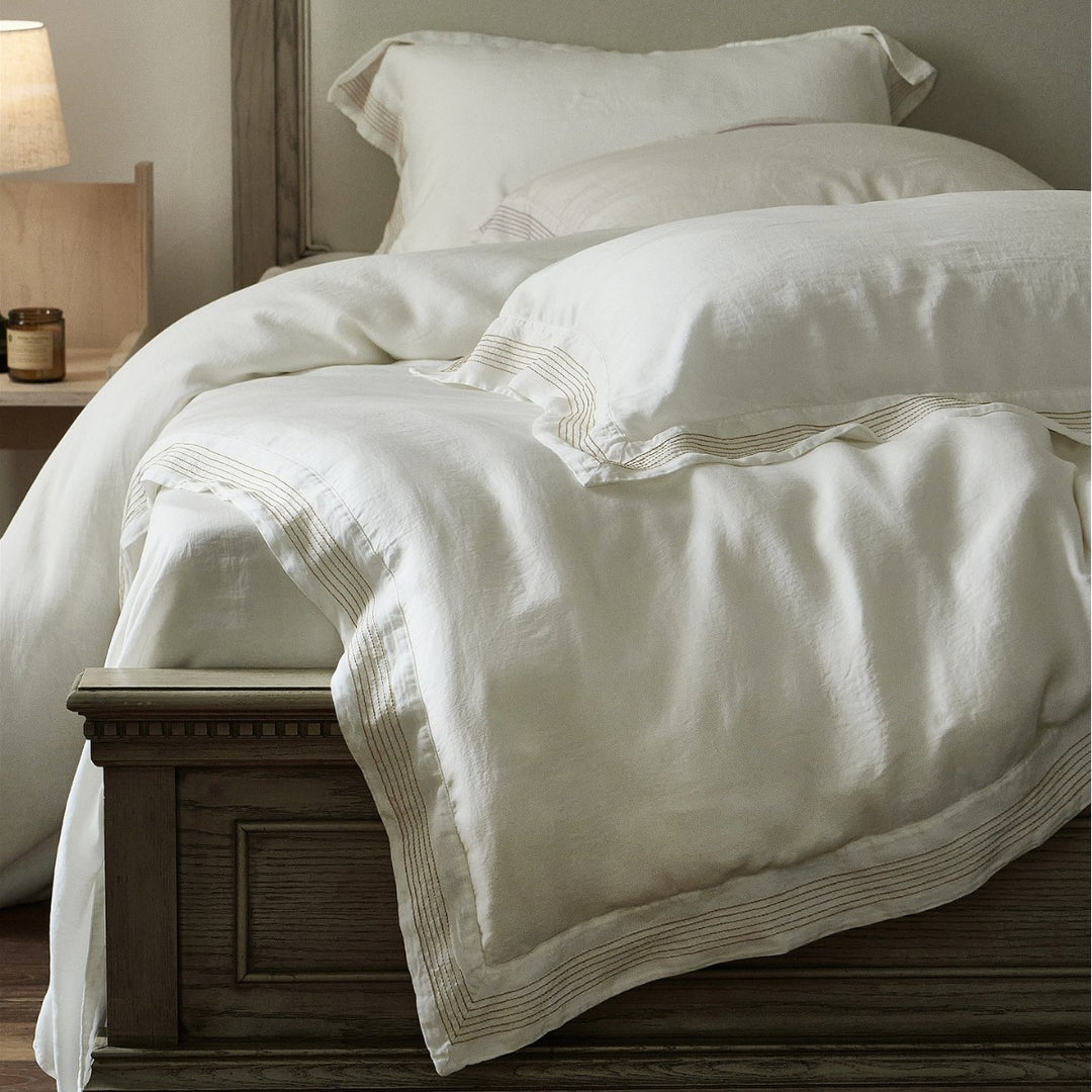 Luxury cotton bedding set with fine piping and elegant linen look