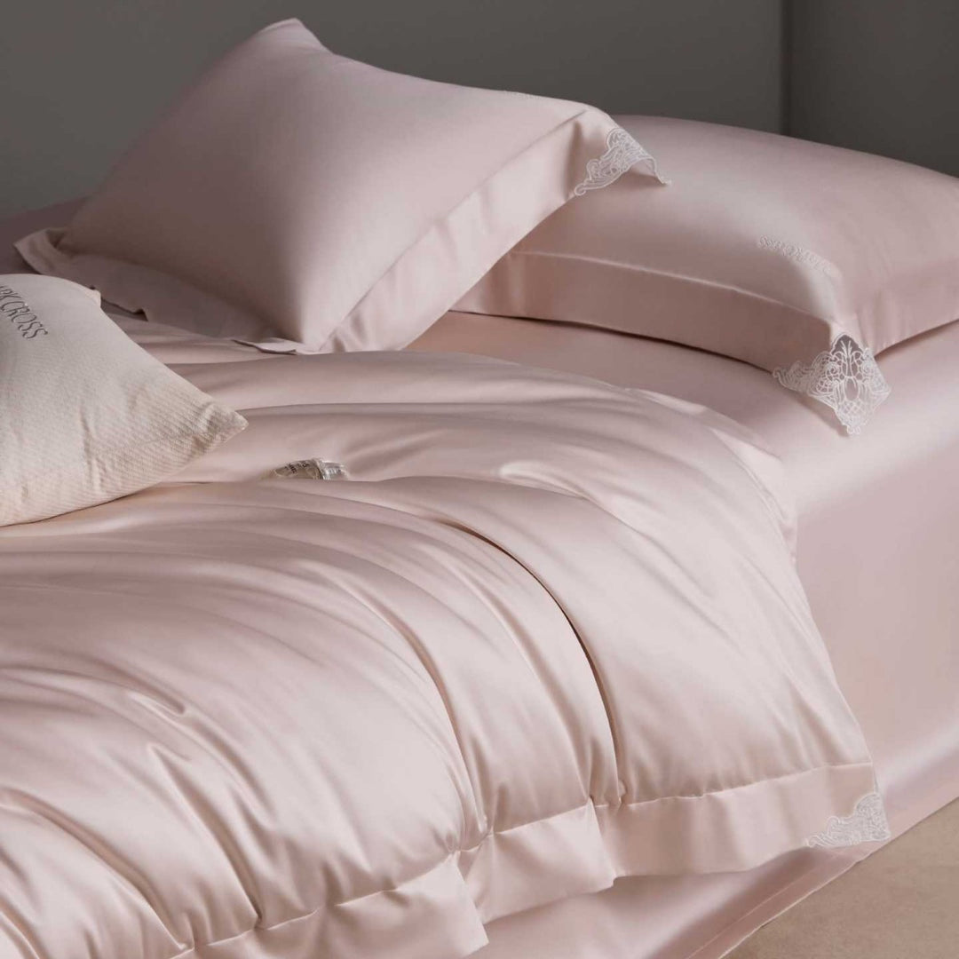 Luxurious cotton satin bedding set with delicate lace trim and hotel finish