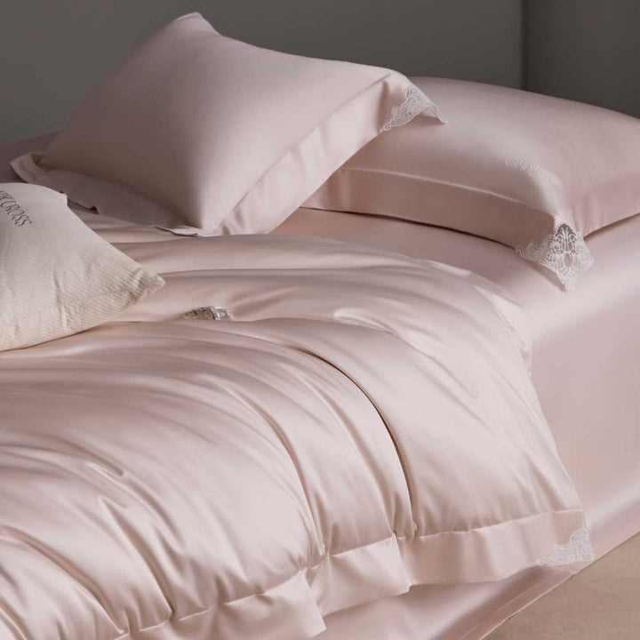 Luxurious cotton satin bedding set with delicate lace trim and hotel finish