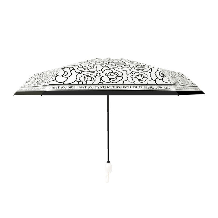 Ladies folding umbrella with playful flower design Kalsten