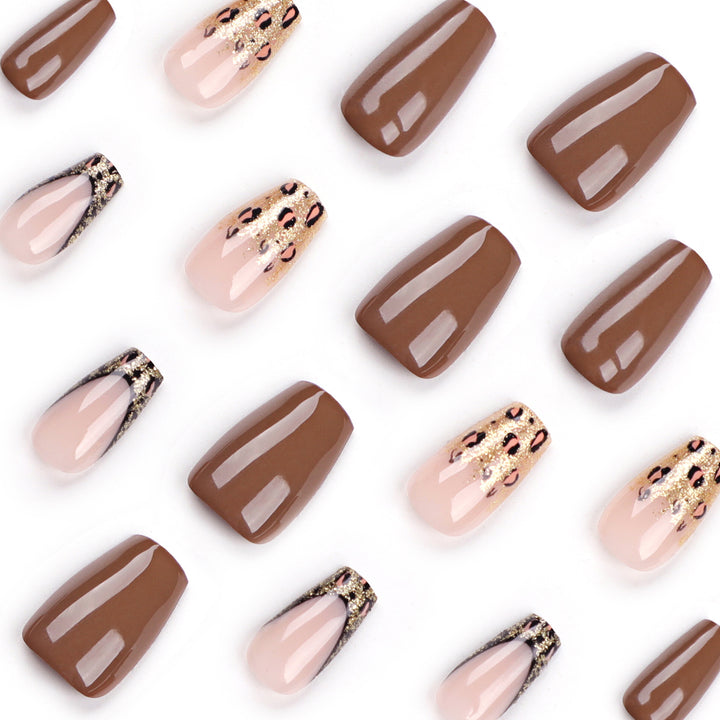 Glamorous acrylic nails with glitter and leopard designs Kalsten