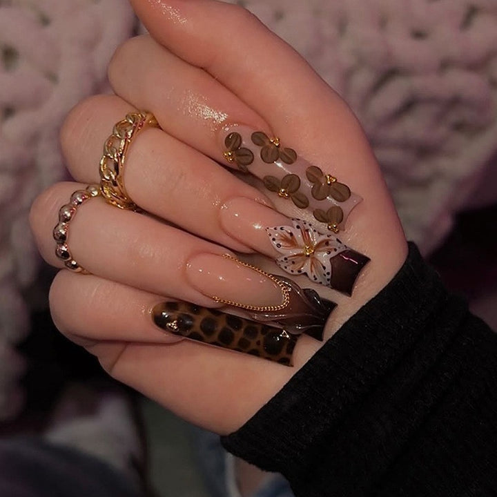 Artificial Nail Art with floral and glamorous design Kalsten