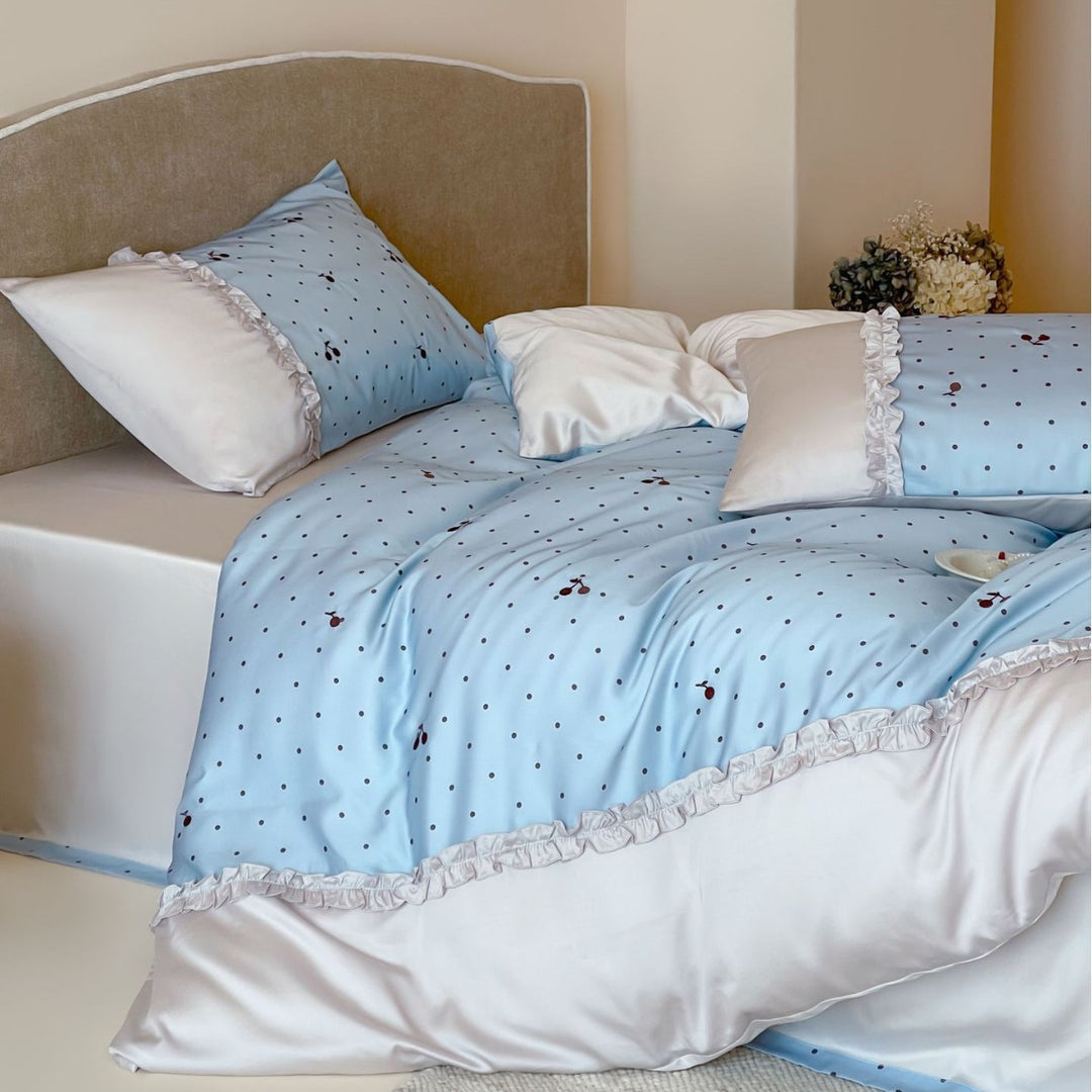 Satin bedding set with delicate ruffles and cherry pattern