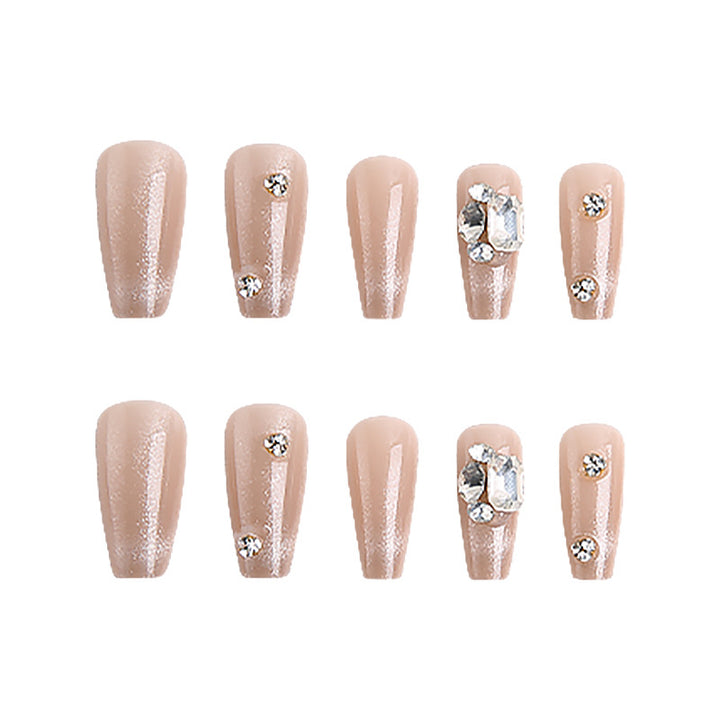 Acrylic nail set with glamorous glitter accents and elegant jewelry embellishments Kalsten