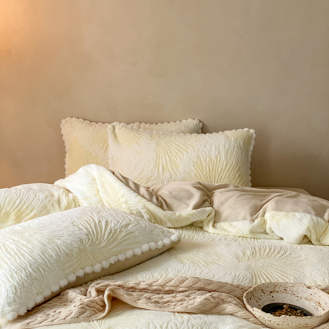 Cozy microfiber bedding set with jacquard floral relief and pompom edge