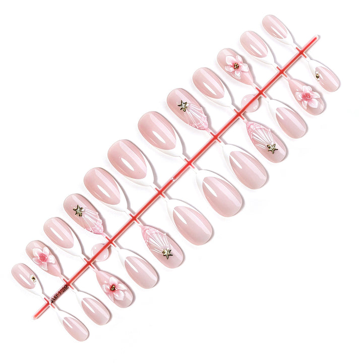 Artificial nail set with delicate flower and glitter applications Kalsten