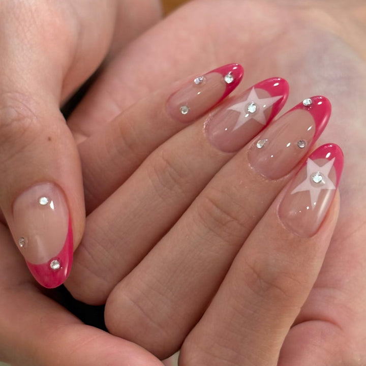 Elegant Press-On Nail Design with Star and Rhinestone Accents Kalsten