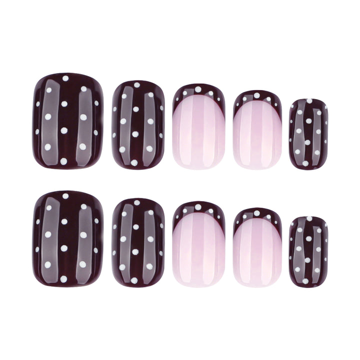 Artful nail art with elegant polka dot design Kalsten