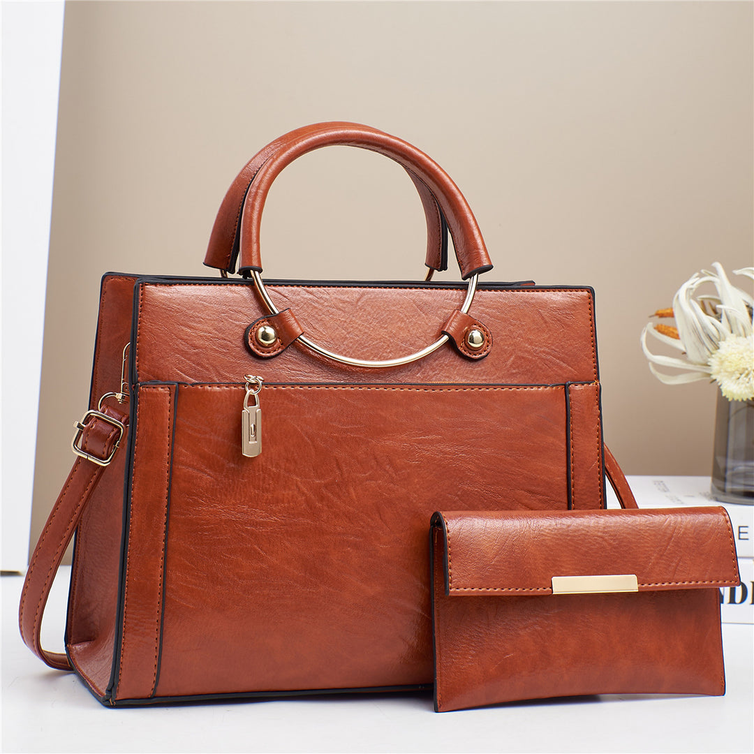 Elegant handbag with detachable shoulder strap and matching wallet Kalsten