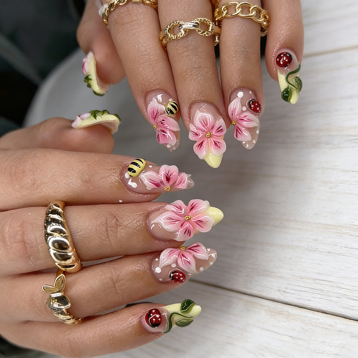 Artificial nail set with floral 3D applications and gloss finish Kalsten