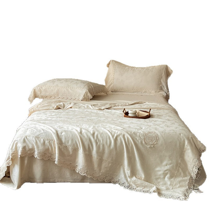 Jacquard bedspread in vintage look with floral appliqué and lace border