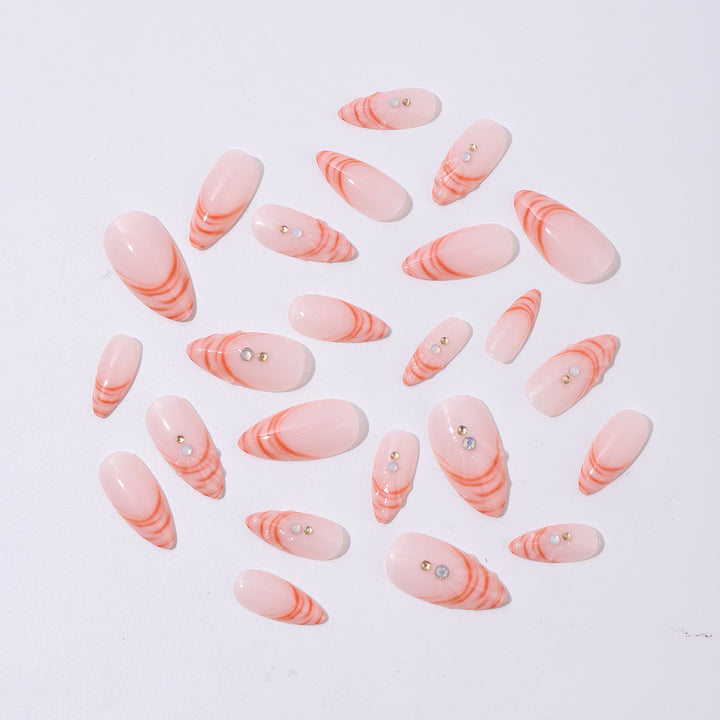Acrylic nail set with curved tip style and glitter accents Kalsten