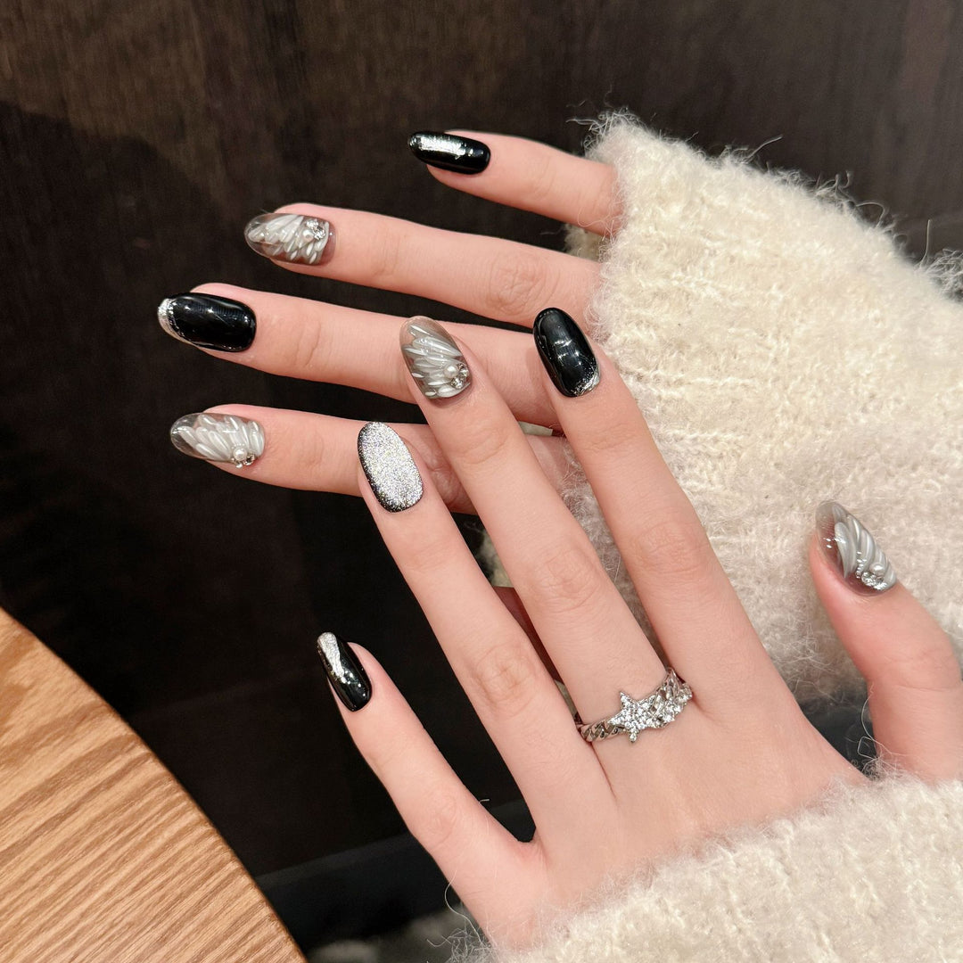 Artistic Press-On Nail Set with Elegant Silver and Black Designs