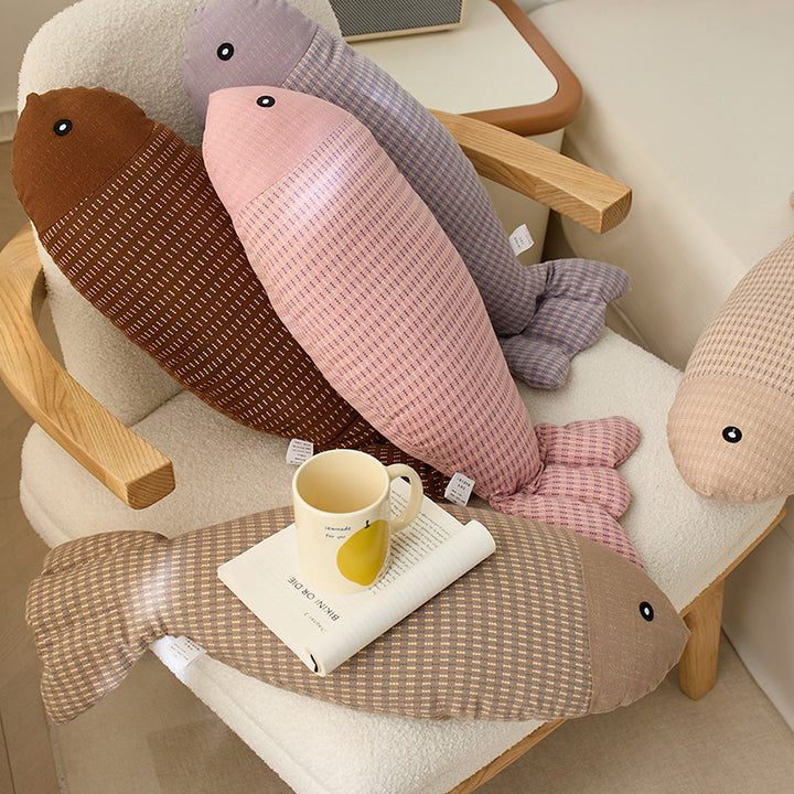 Decorative fish cuddle pillow made of textured cotton blend