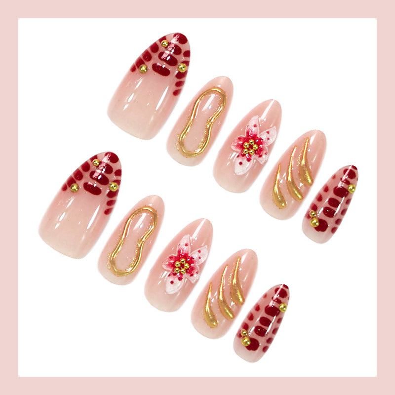 Creative nail art set with floral embellishments and glamorous accents Kalsten
